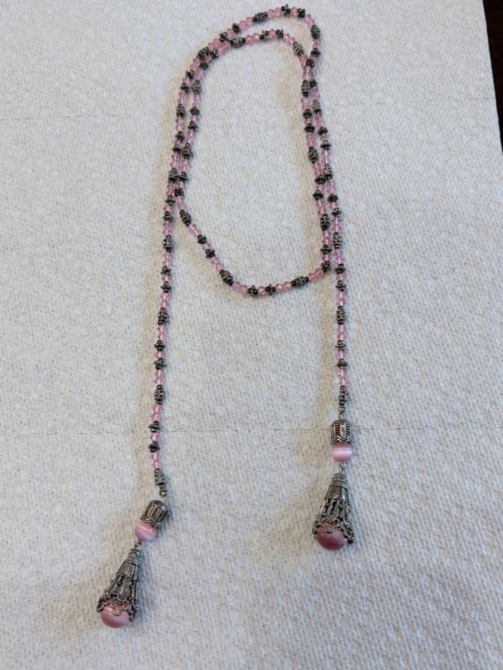 Vintage pink glass and cat's eye bead lariat / tassel necklace
